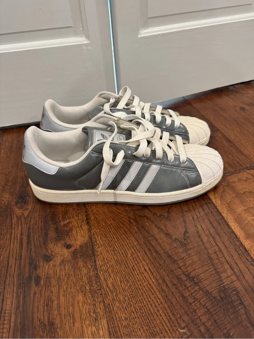 adidas Men’s Gray and White Shell Toe Sneakers